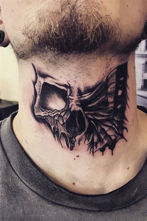 skull neck tattoo